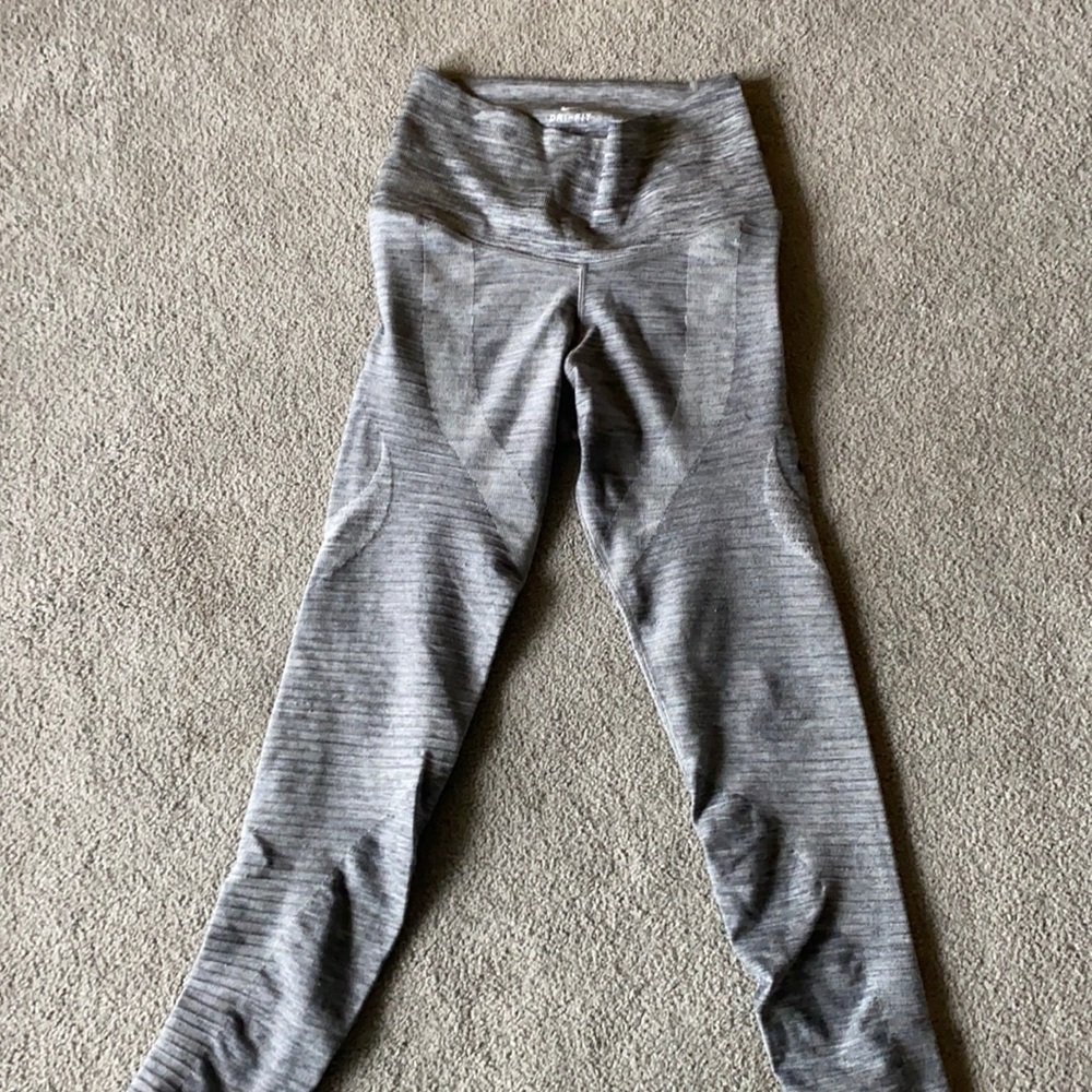 Nike cold weather dry-fit leggings. Size M